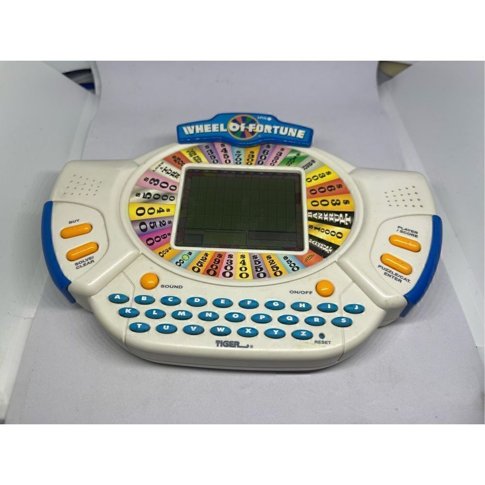 Wheel of Fortune Tiger Electronics handheld 1998  and 1999 deluxe Cartridge